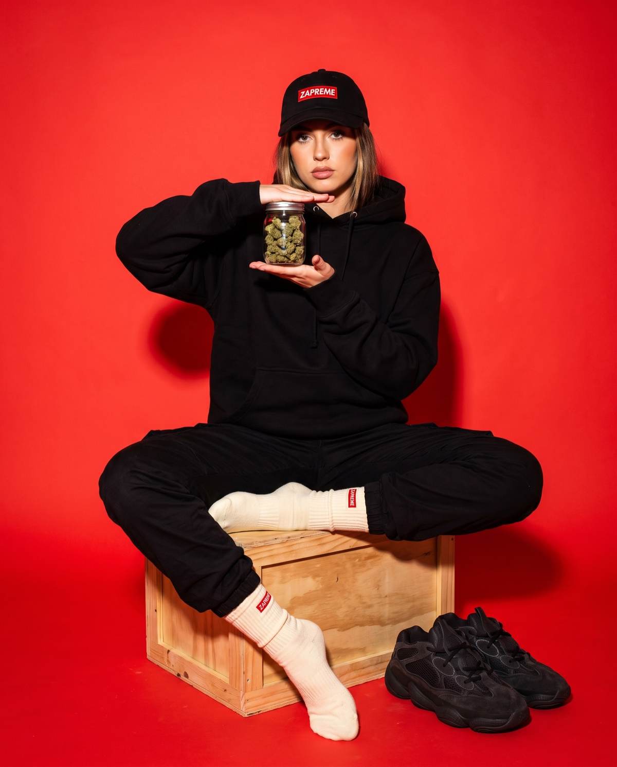ZAPREME studio shot with a jar of flower
